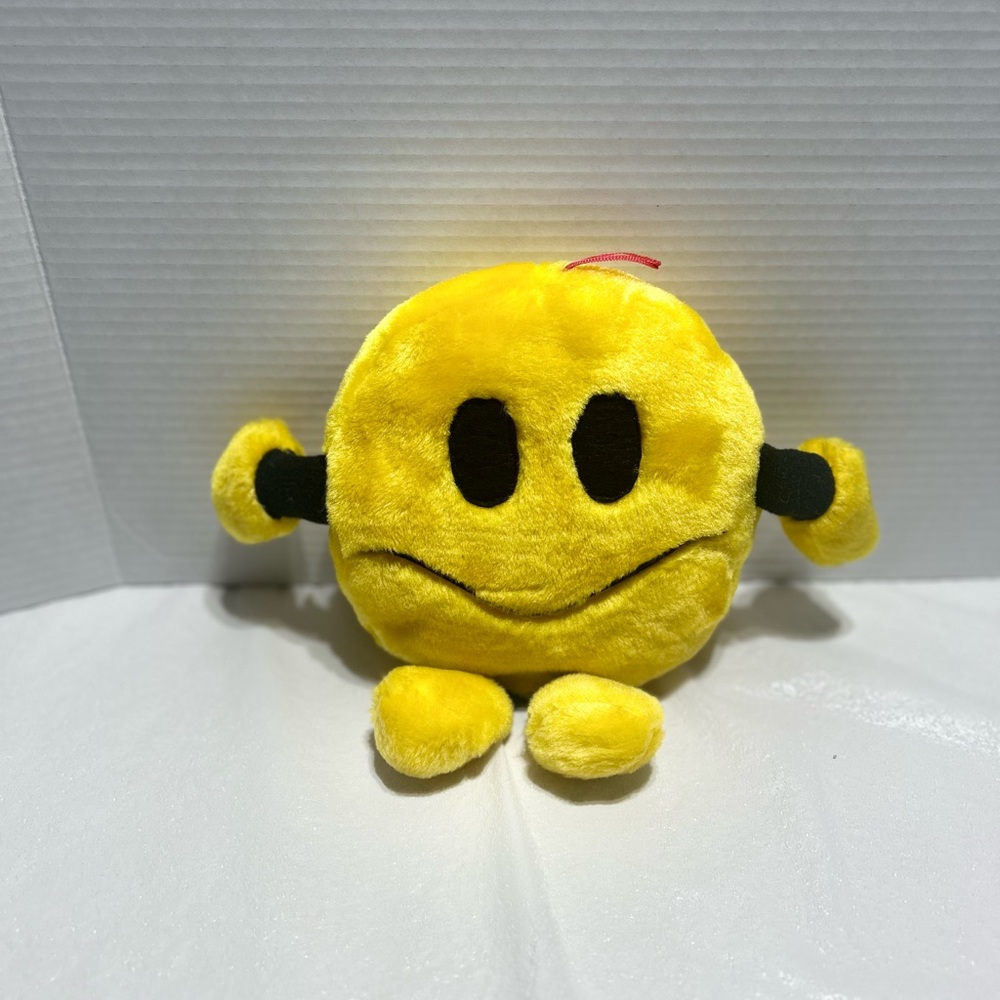 Cheerful Yellow Plush Smiley Toy